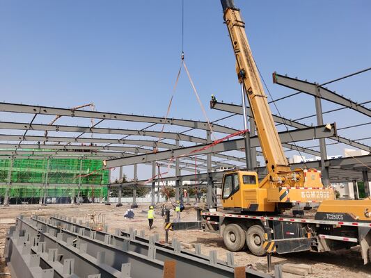 Ön Tasarım Metal Bina Q355B Kaynaklı H Kiriş Çelik Yapı İnşaatı Endüstriyel Depolama İçin